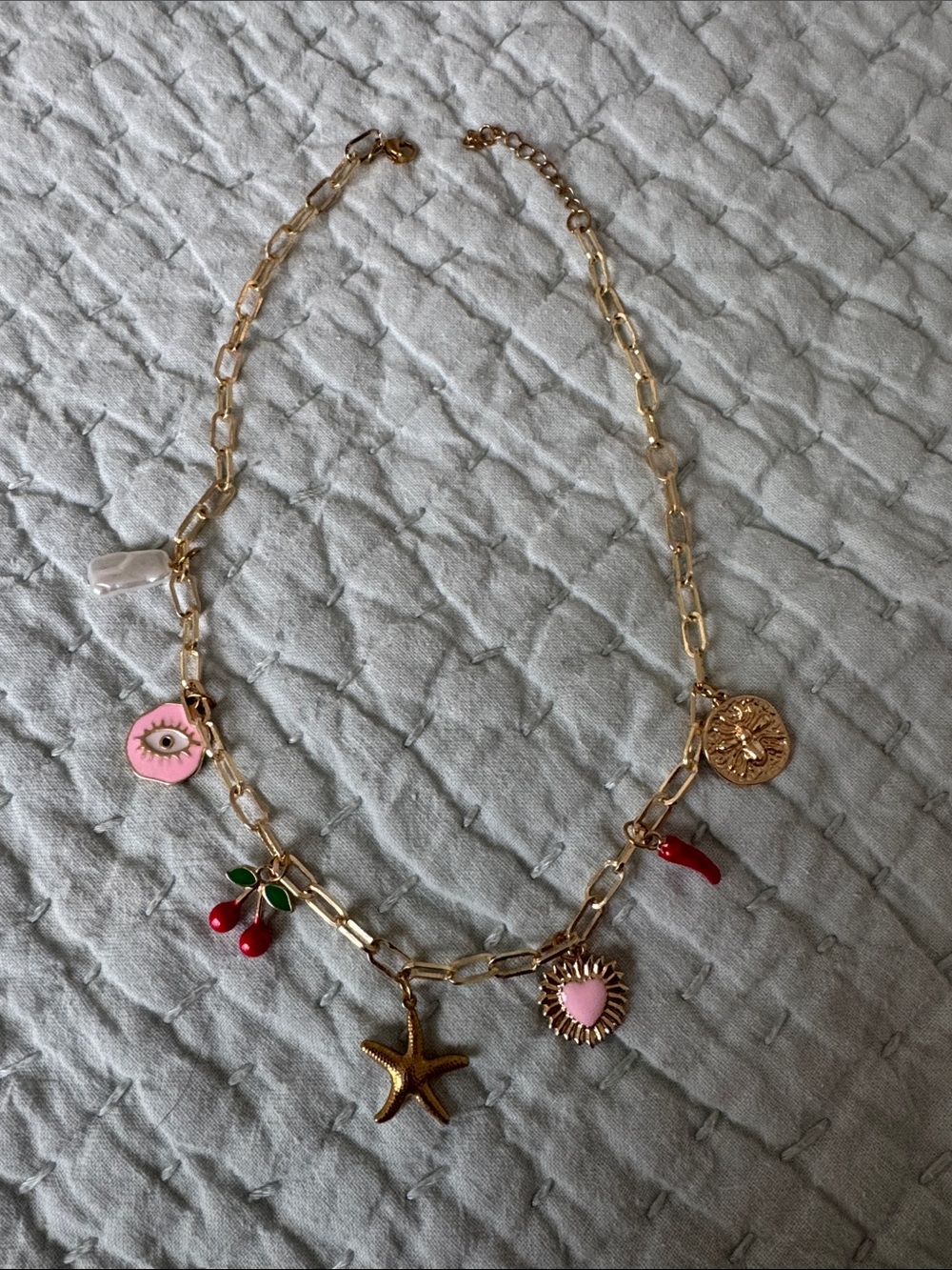 Gold-tone Charm Necklace with Pink, Red & Green Accents